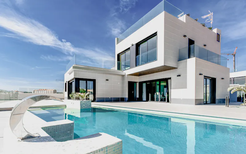 Contemporary white residence with pool