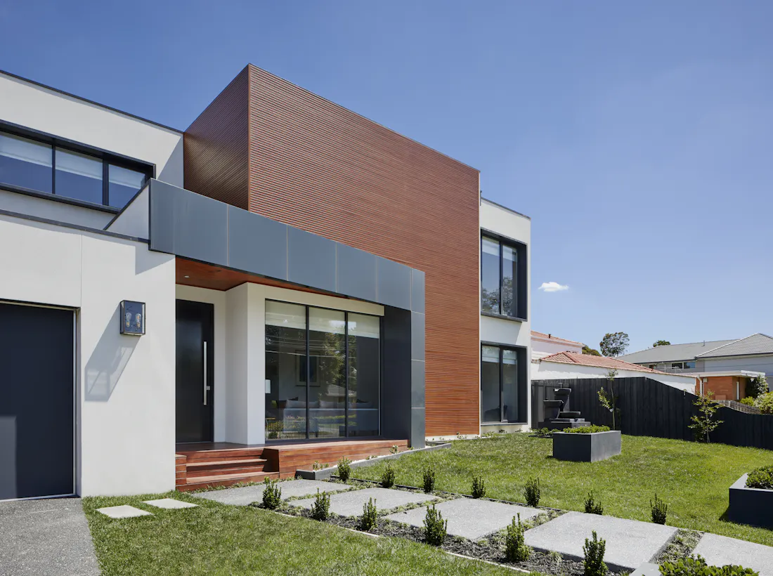 Modern two-storey home with timber and rendered facade